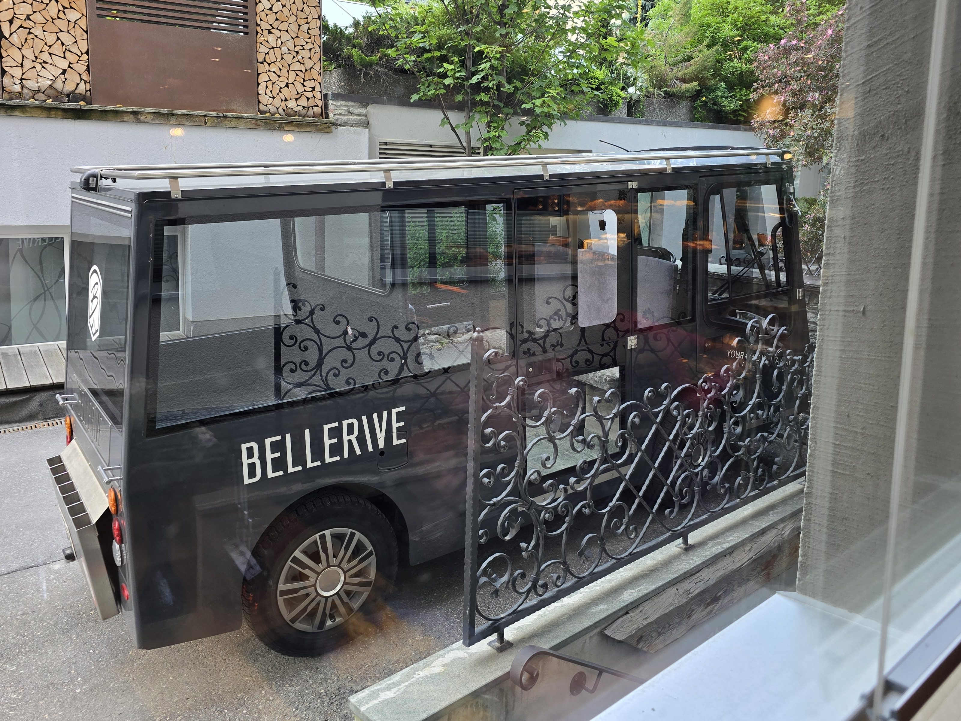 Hotel Bellerive electric taxi, as seen from the window while we ate breakfast