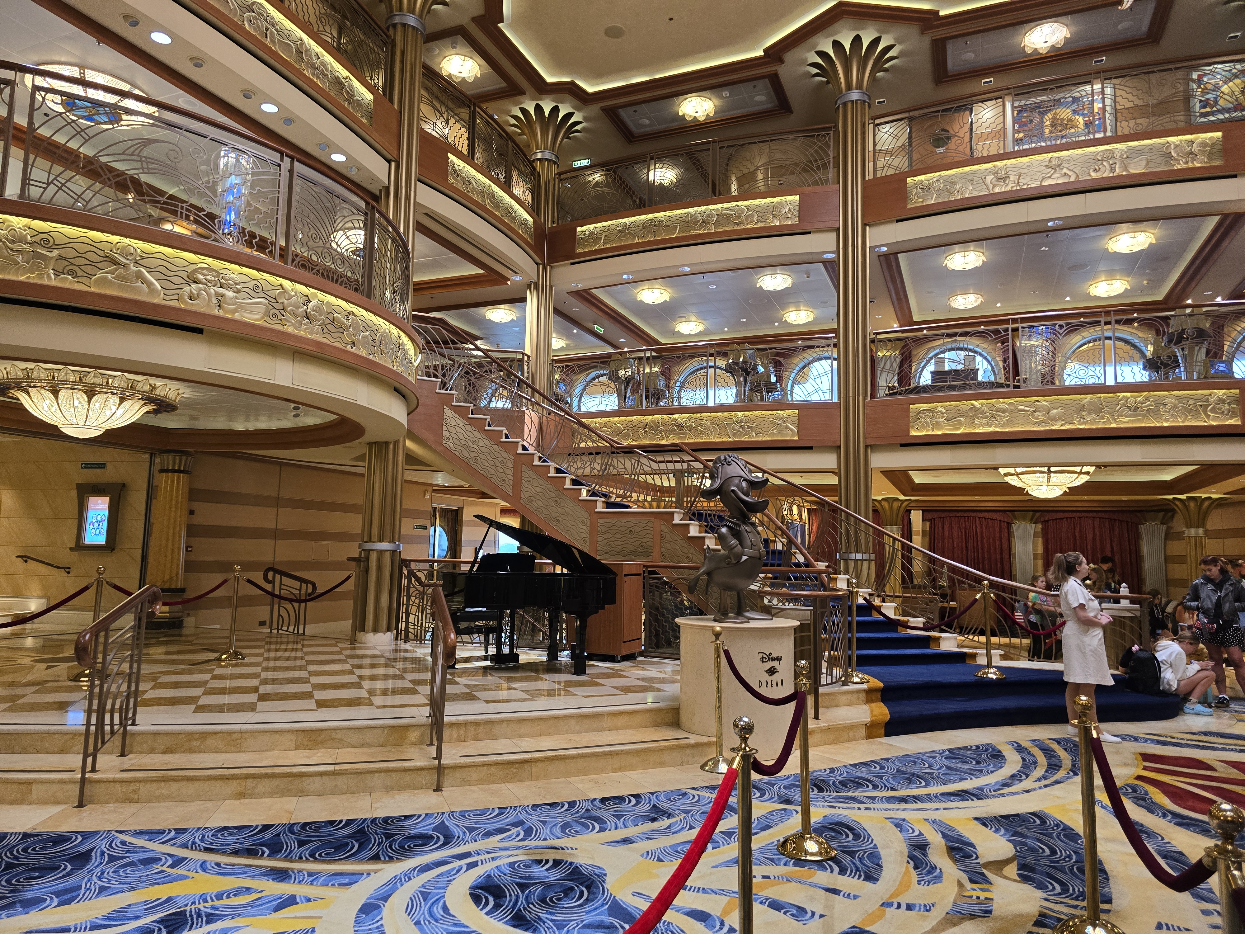 The atrium of the Disney Dream, as seen looking back from the debarkation line...